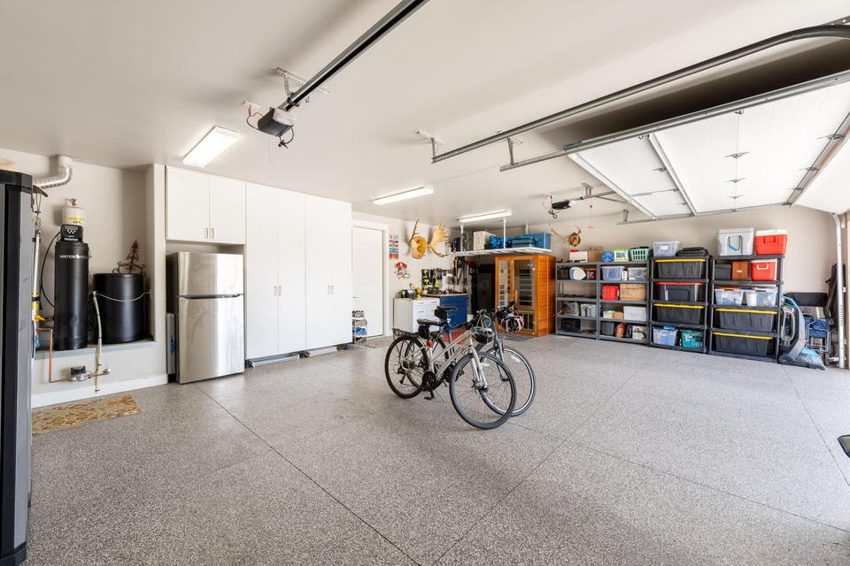 Garage with freestanding refrigerator