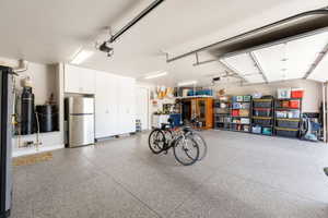 Garage with freestanding refrigerator