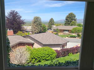 Aerial view of residential area featuring mountains