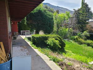 View of yard with a mountain view