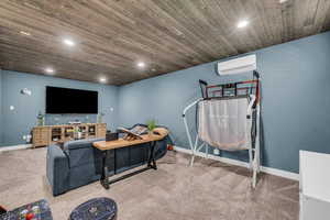 Carpeted living room featuring wooden ceiling and recessed lighting