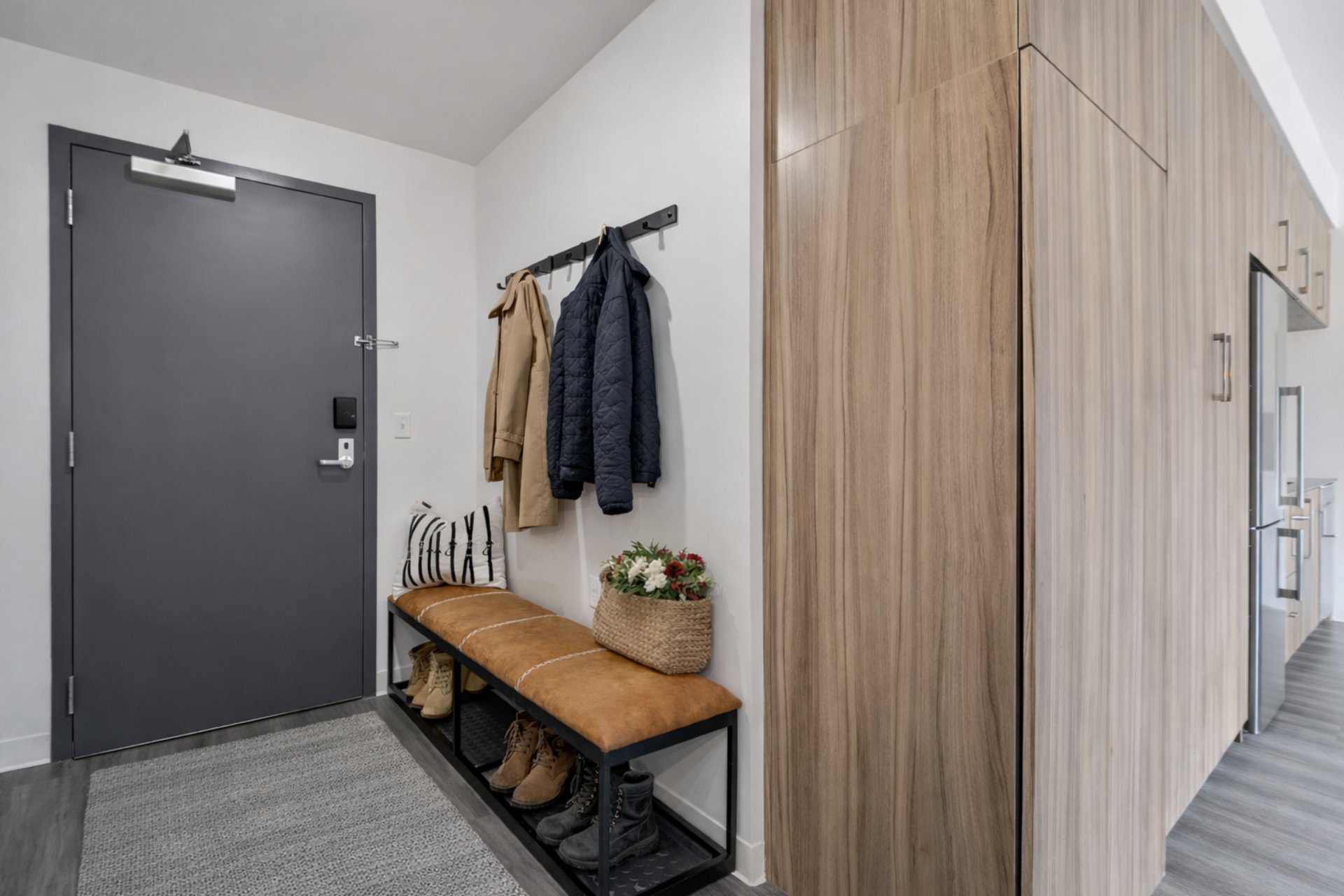 Mudroom featuring light wood finished floors