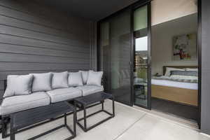 Balcony featuring an outdoor hangout area