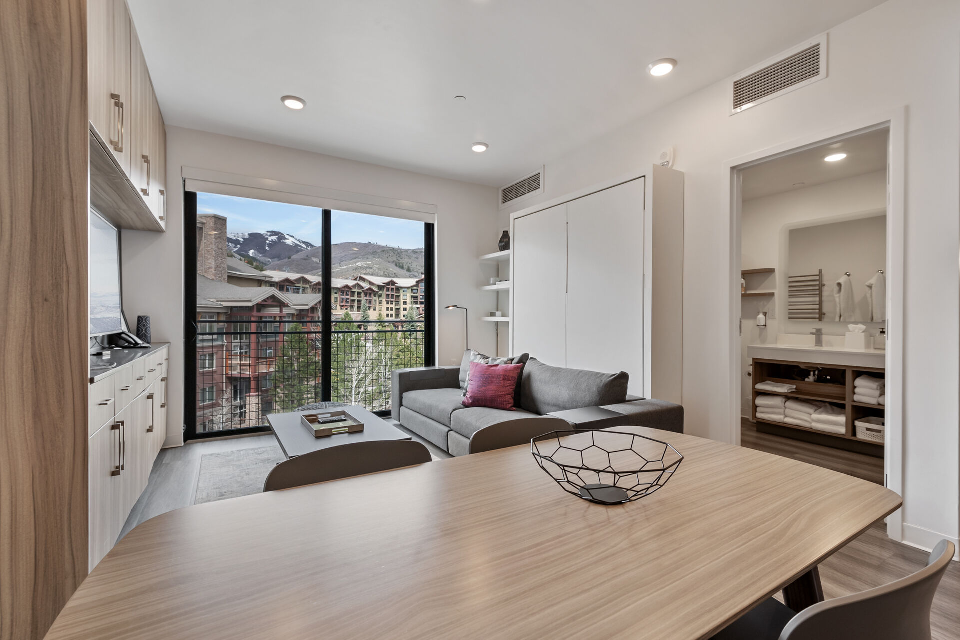 Dining room with recessed lighting and light wood-style floors