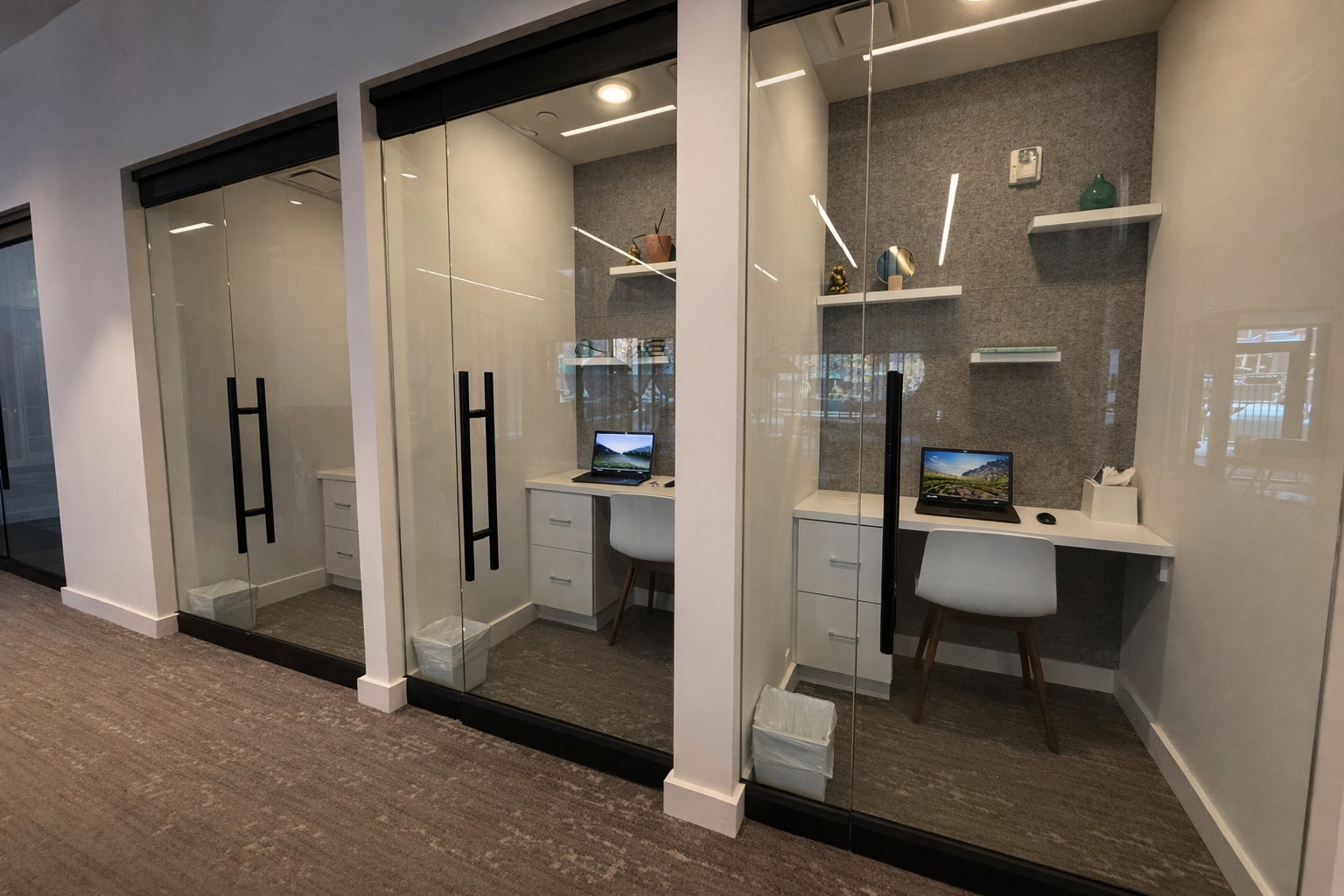 Office with built in study area and dark wood-style flooring