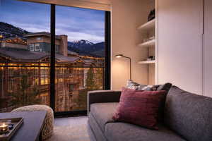 Bedroom featuring a mountain view and wood finished floors