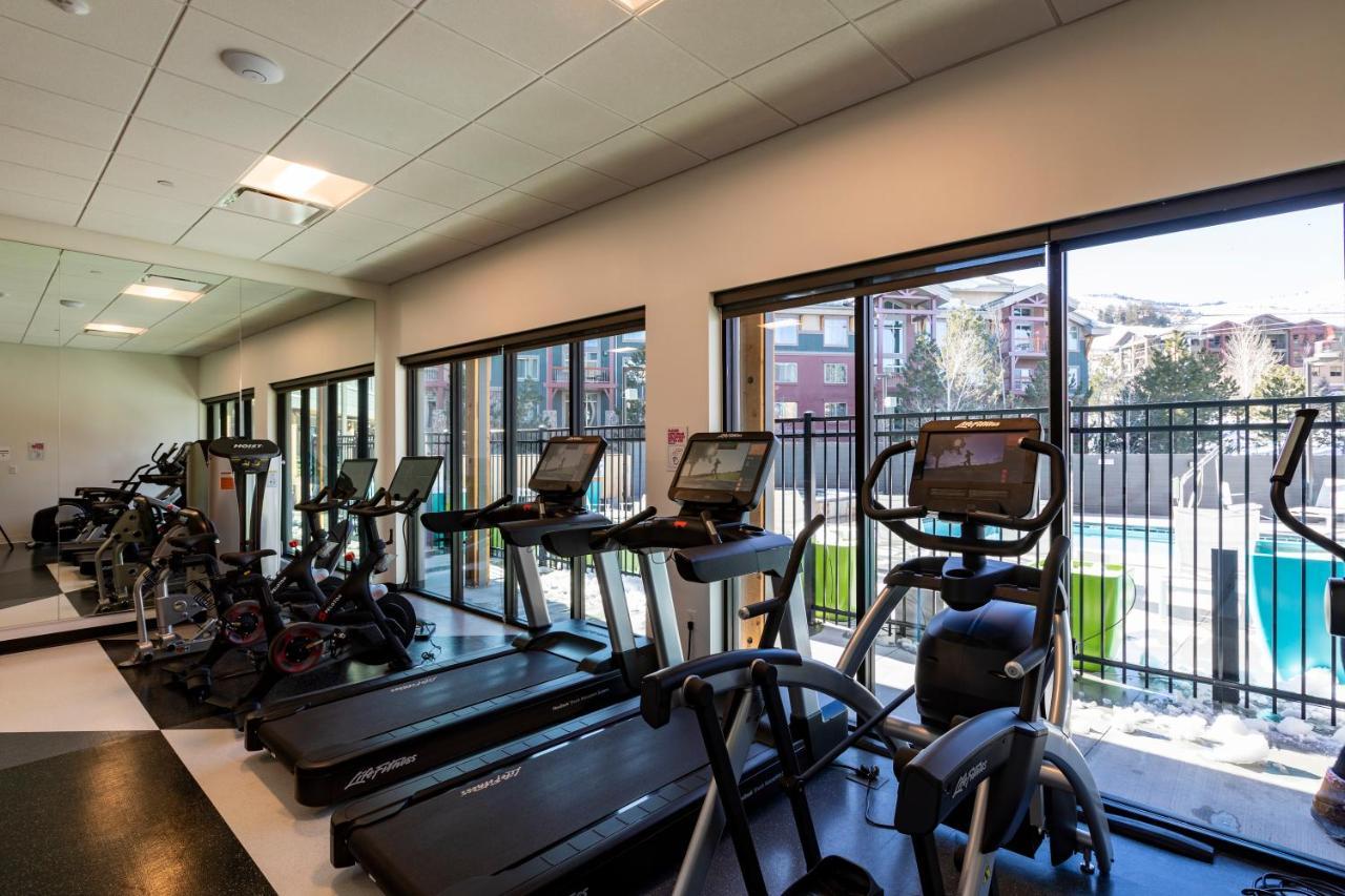Workout area featuring a drop ceiling