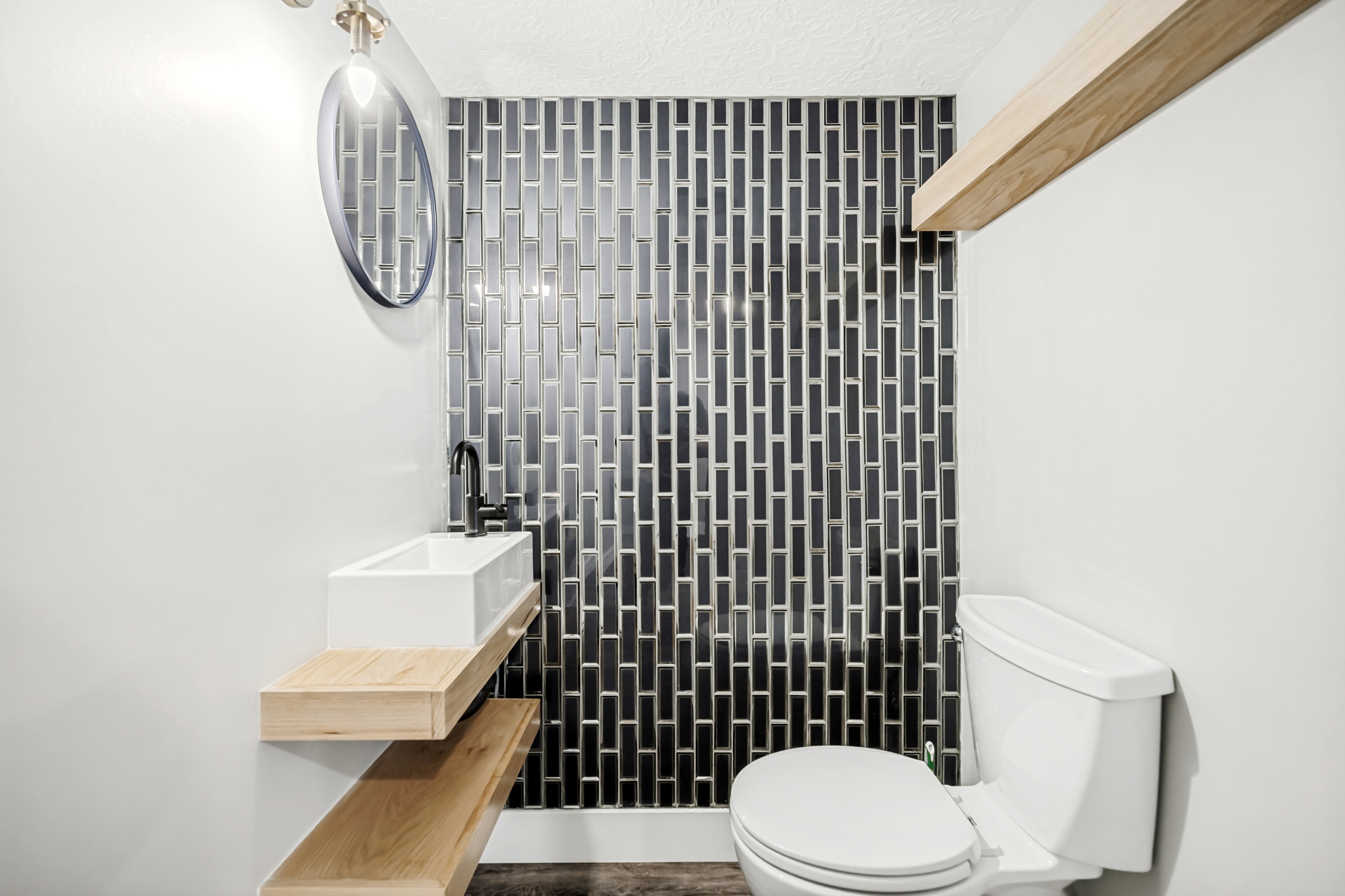 Half bath with vanity and toilet