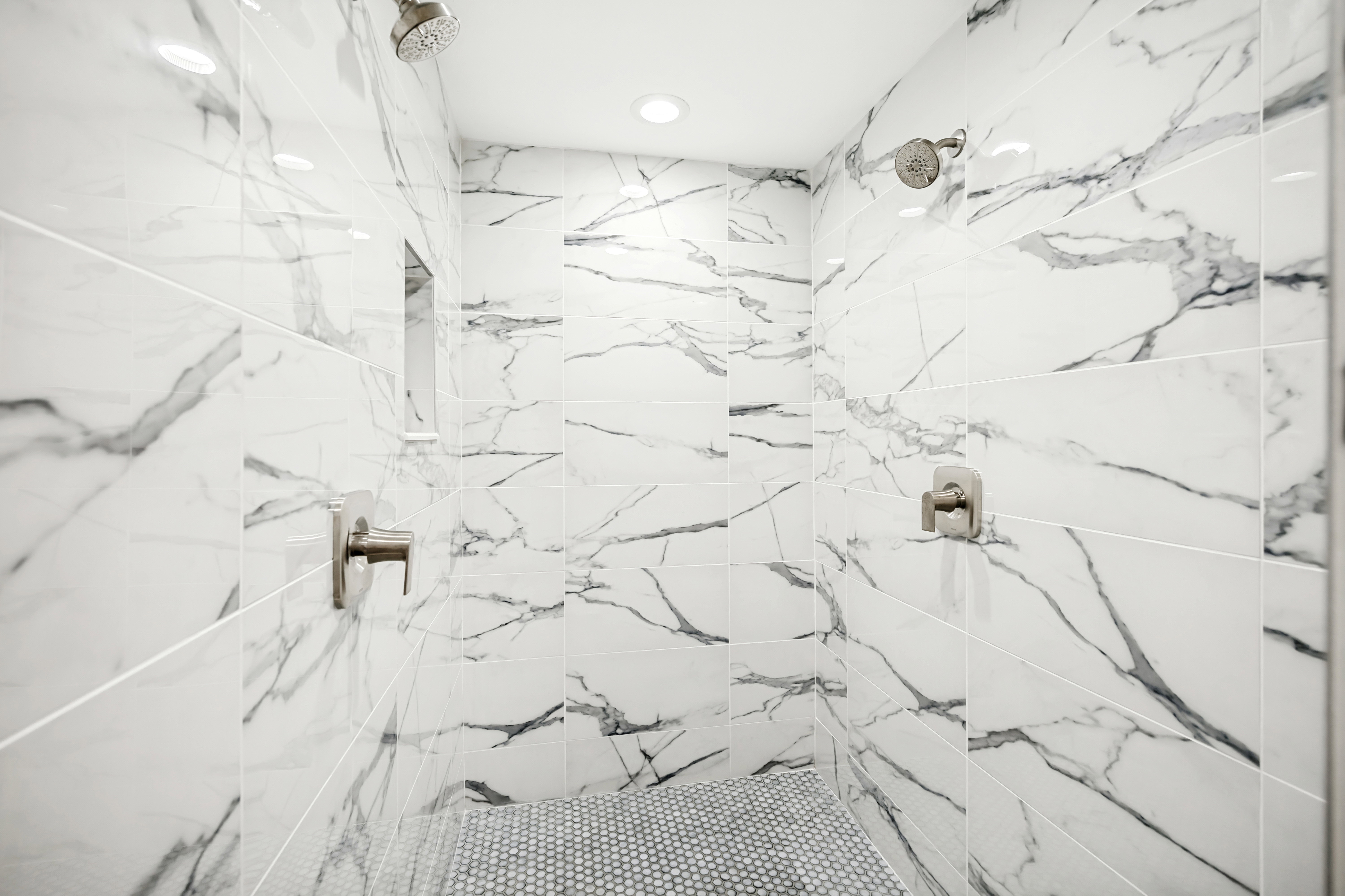 Full bathroom featuring a marble finish shower