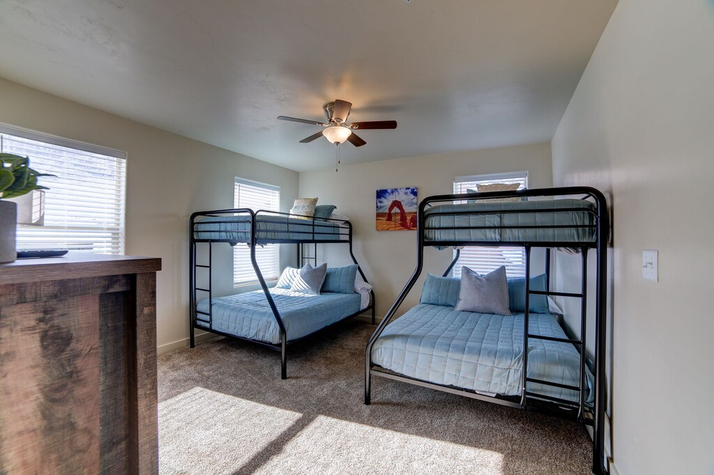 Bedroom with carpet floors and ceiling fan