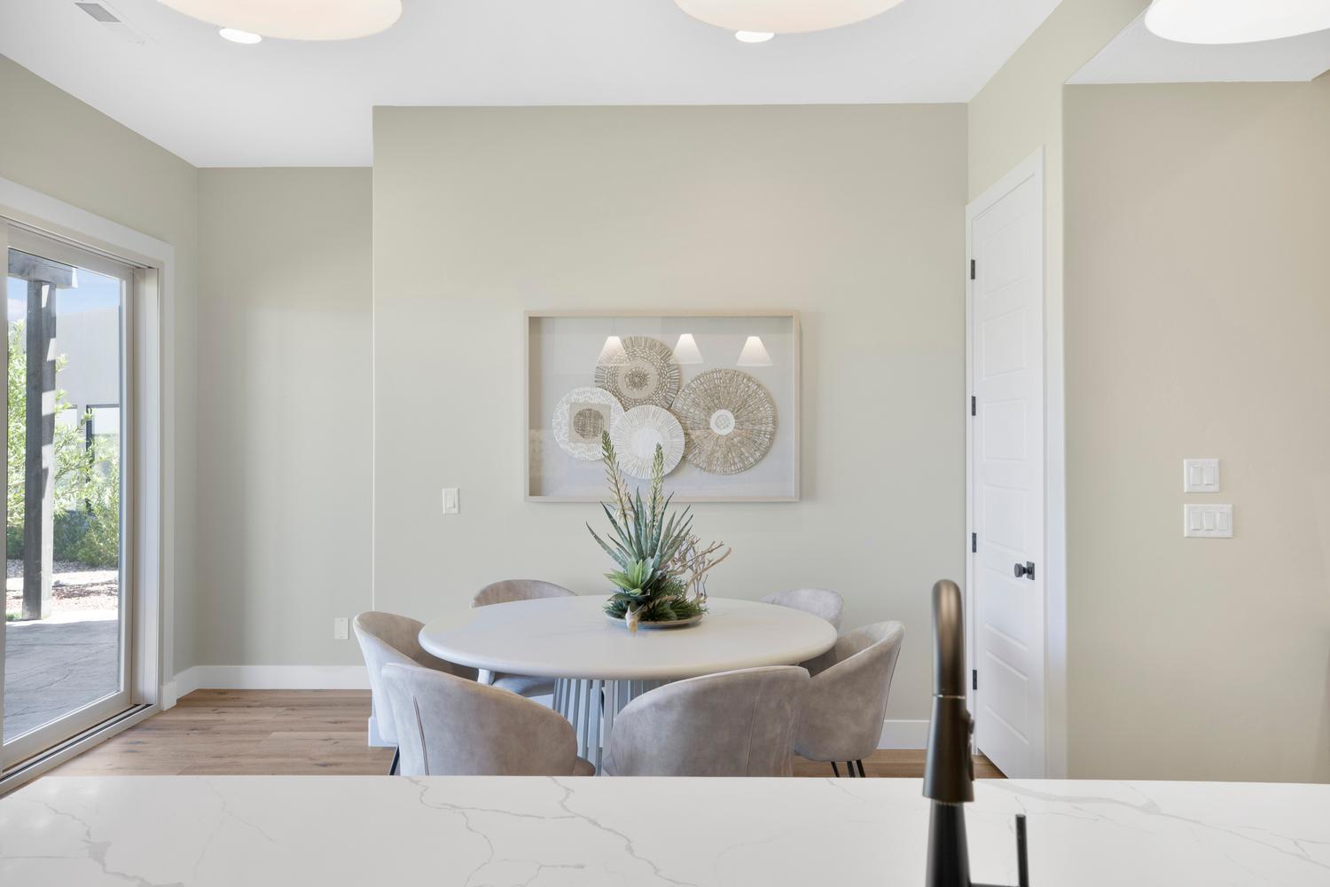 Dining area featuring wood finished floors and baseboards