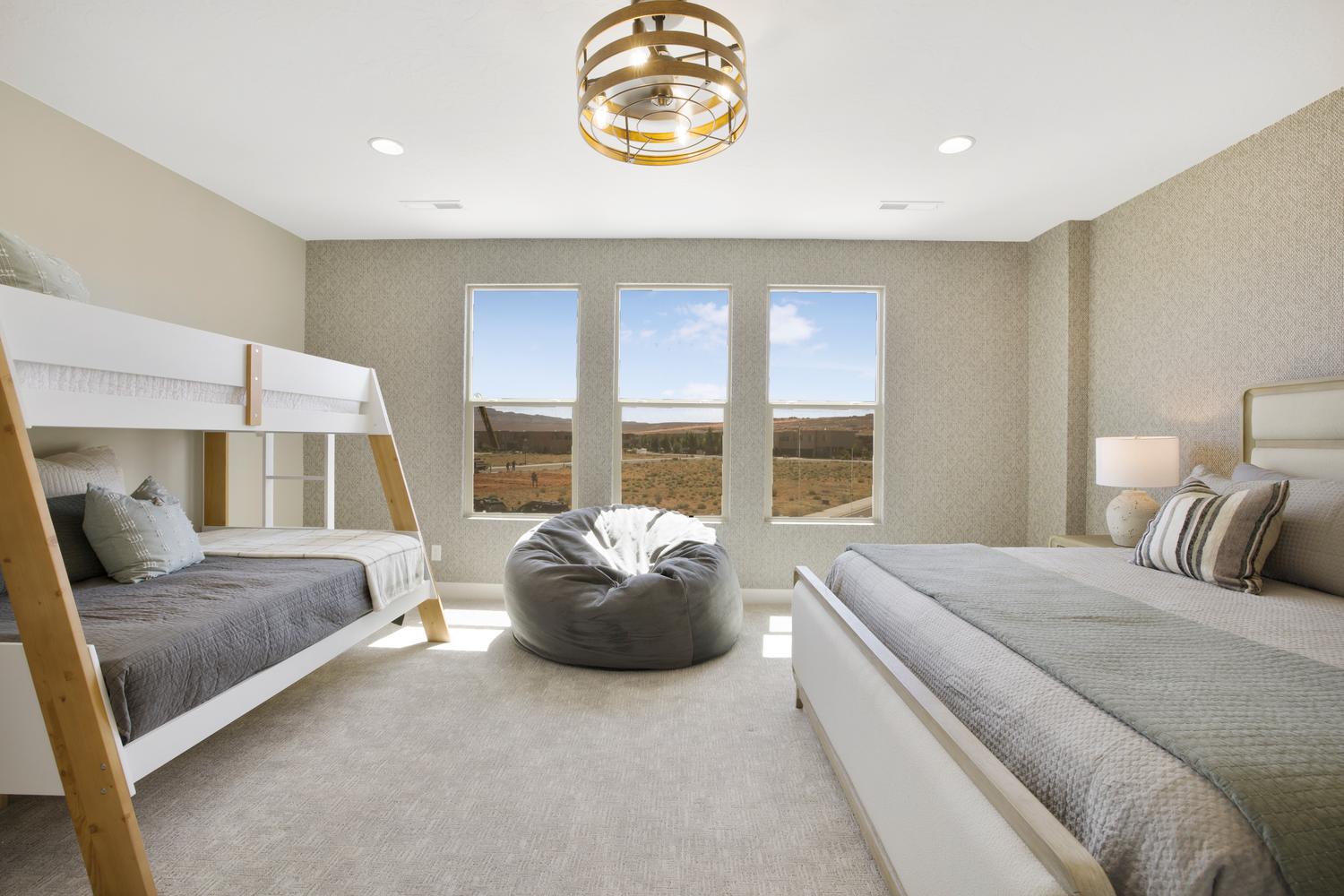 Carpeted bedroom with recessed lighting and wallpapered walls