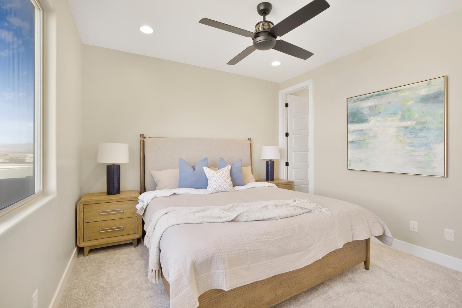 Bedroom featuring ceiling fan, carpet floors, and recessed lighting