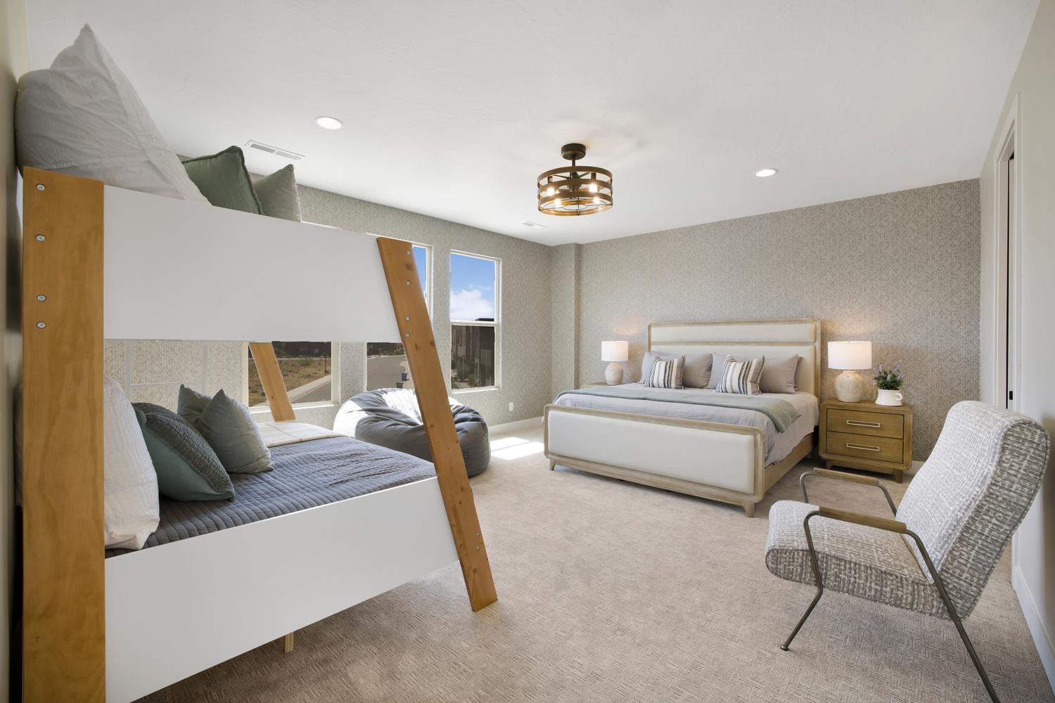 Bedroom featuring wallpapered walls, light colored carpet, and recessed lighting