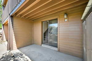 Patio at basement level,  view of the golf course.