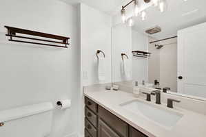 Full bathroom featuring vanity and a shower/tub combo
