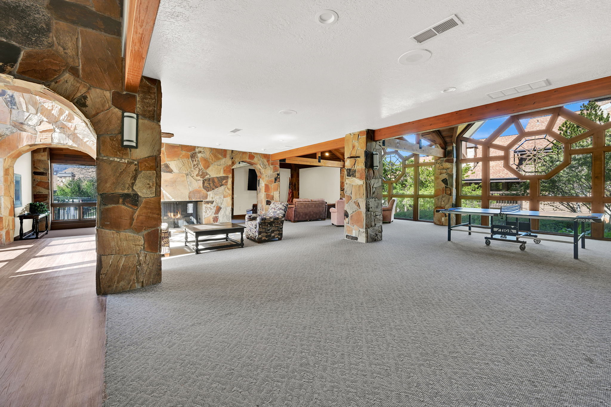 Sitting area within clubhouse and ping pong table