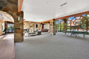 Sitting area within clubhouse and ping pong table