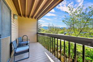 Balcony with mountain and golf course views