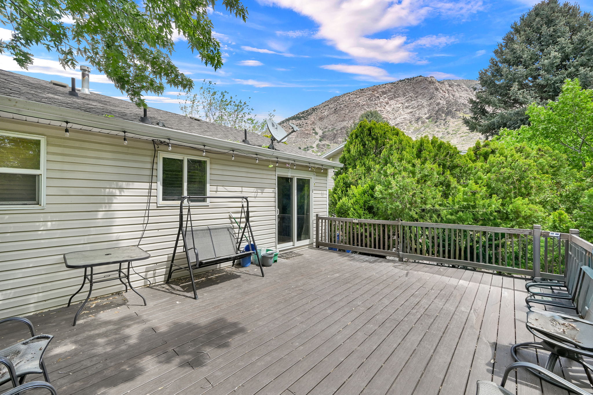 Wooden deck featuring a mountain view