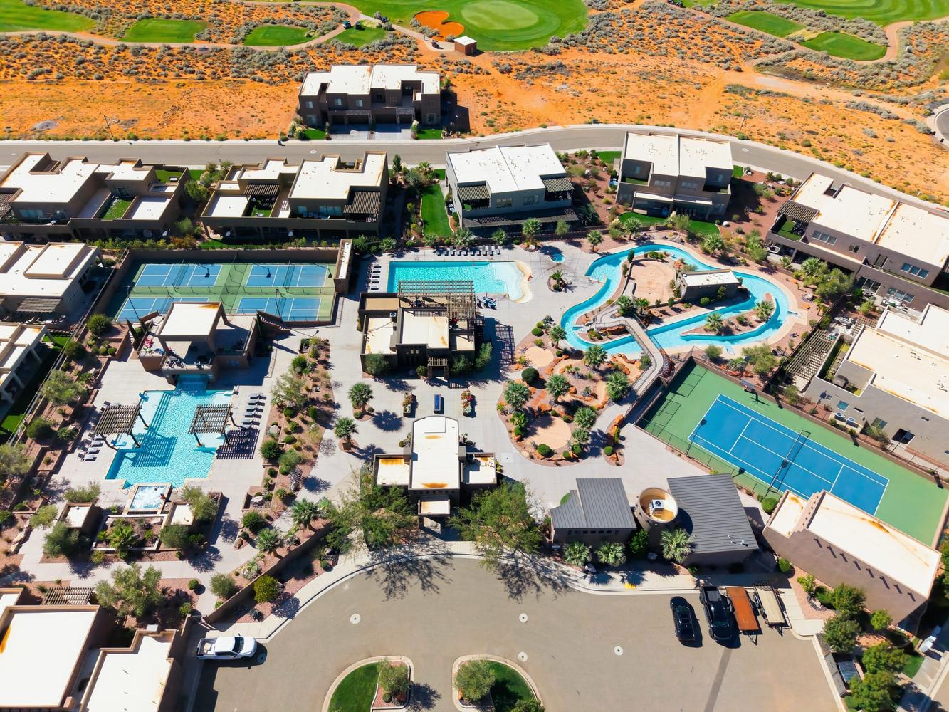 Aerial overview of property's location with a golf club