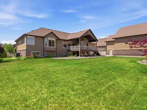 Expansive lawn with mature landscaping