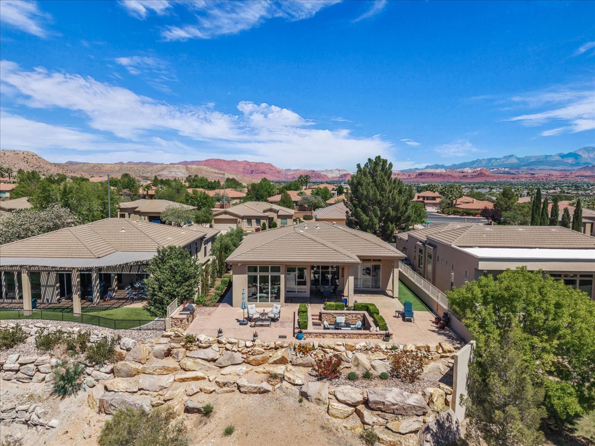 Aerial view of residential area featuring mountains