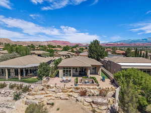Aerial view of residential area featuring mountains