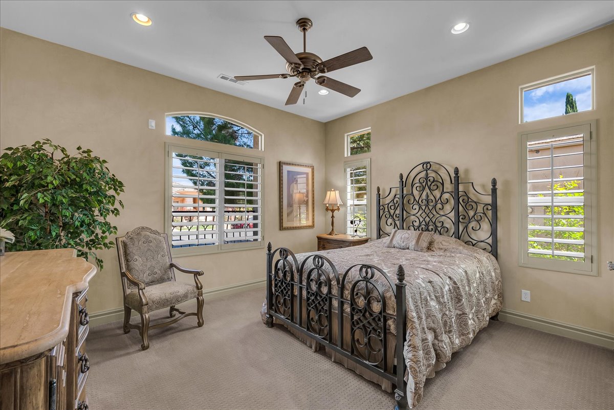 Bedroom with recessed lighting, a ceiling fan, and carpet flooring