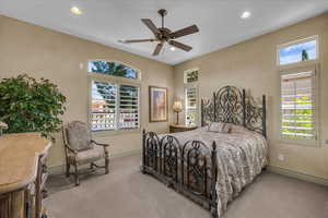Bedroom with recessed lighting, a ceiling fan, and carpet flooring