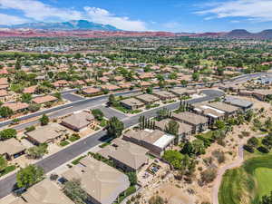 Aerial view of residential area featuring mountains