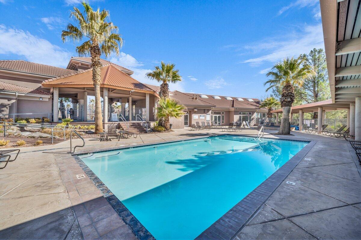 Community pool featuring a patio area