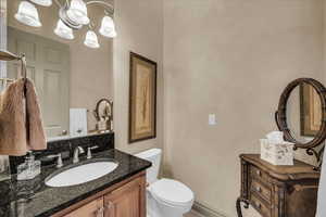 Bathroom with vanity and toilet