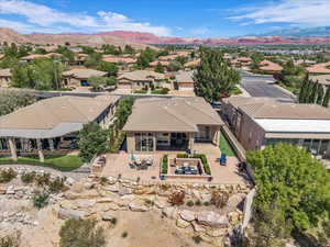 Aerial view of residential area featuring a mountain backdrop