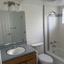 Full bathroom featuring vanity and shower / bathtub combination