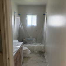 Full bathroom with vanity and shower / bath combination with curtain