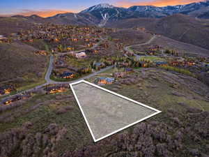 Expansive undeveloped parcel featuring natural terrain and sparse vegetation