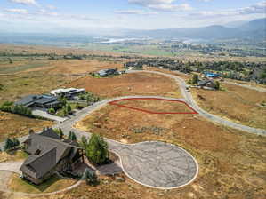Expansive undeveloped parcel with a clear, buildable area outlined in red