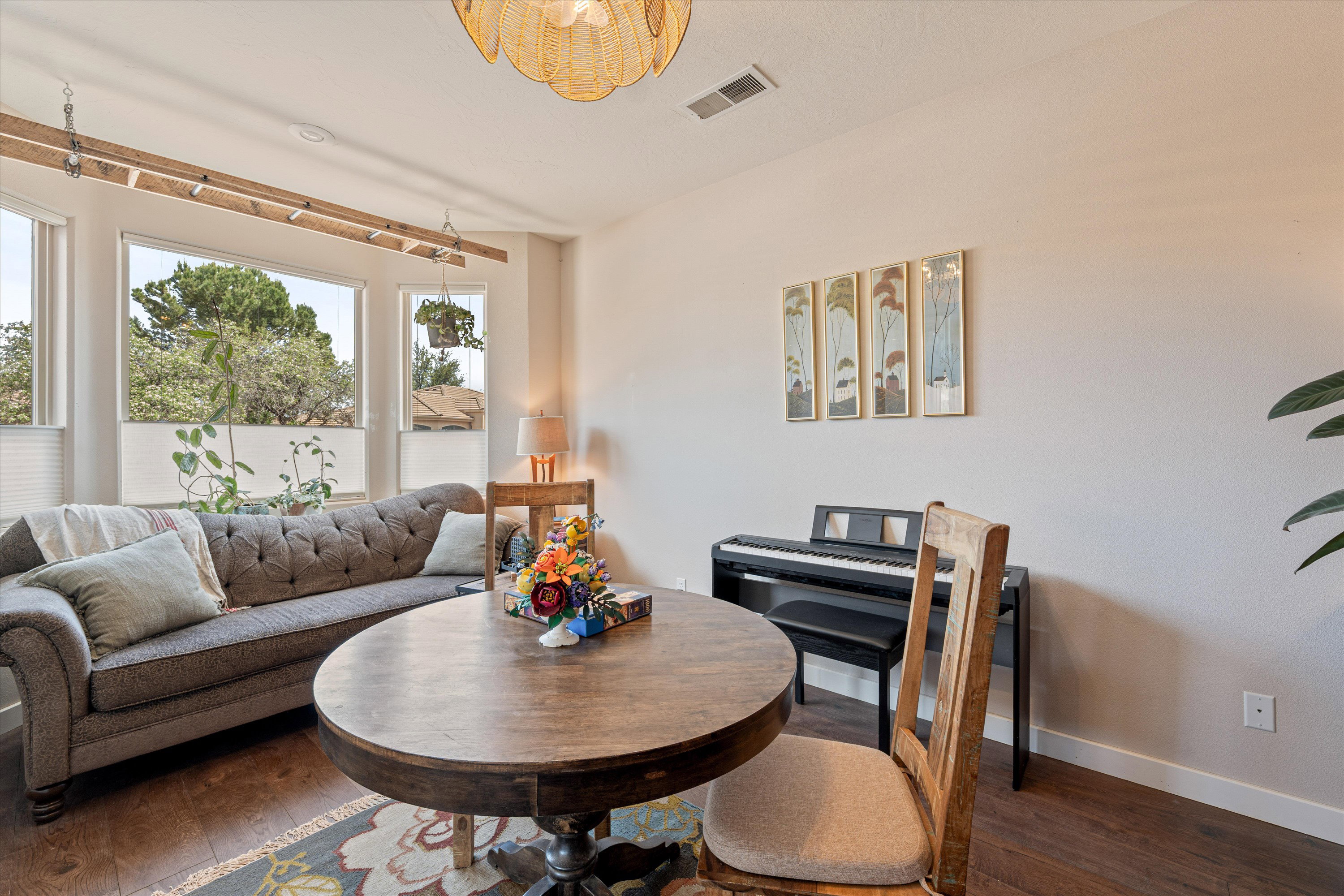 Living room with hardwood / wood-style flooring