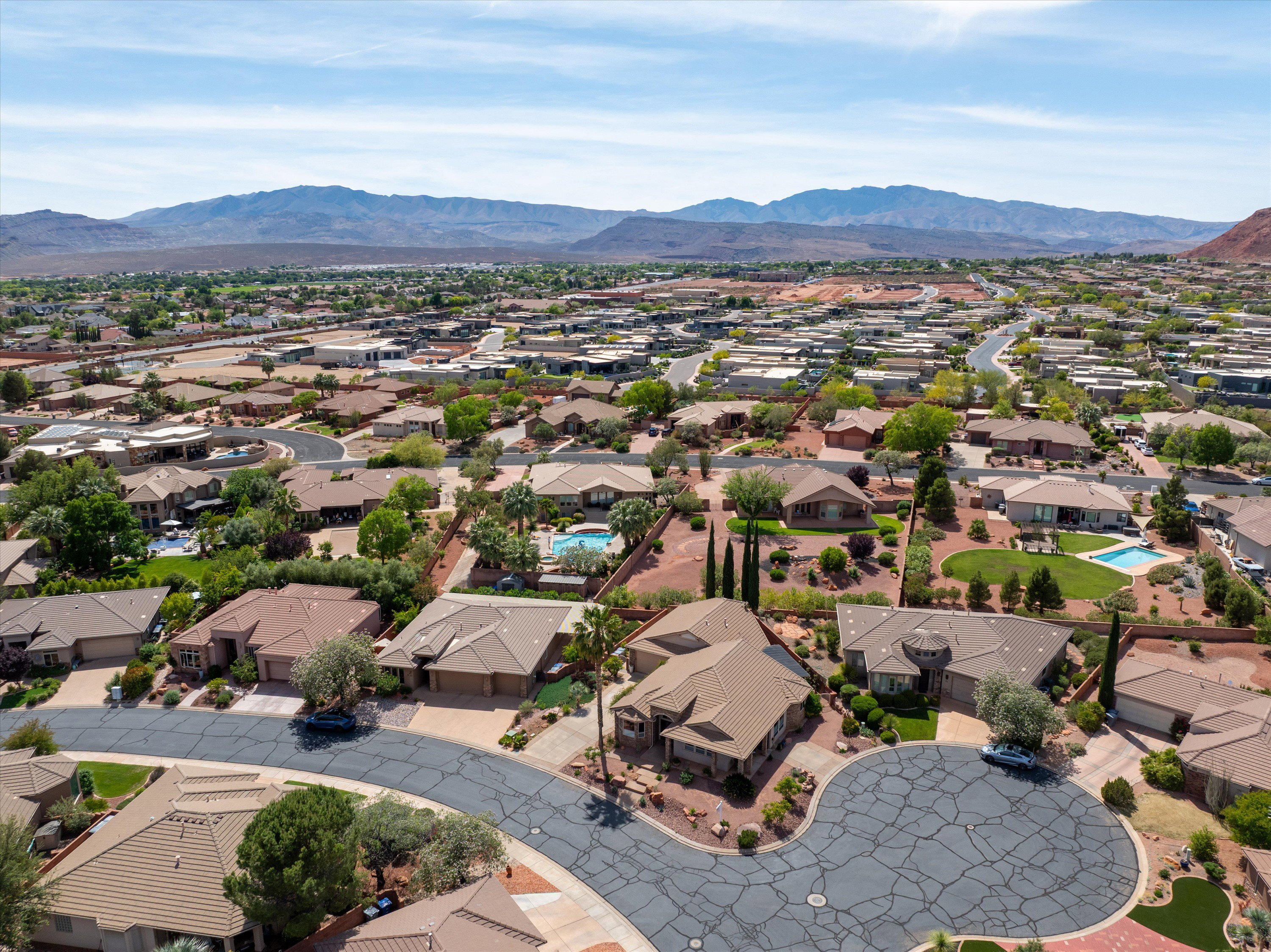 Aerial view of residential area with a mountainous background
