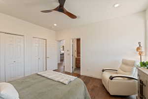 Bedroom featuring two closets, dark wood-style floors, ceiling fan, and recessed lighting