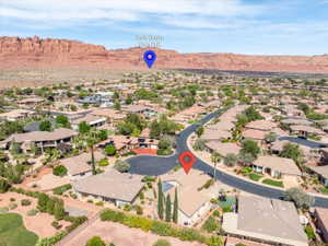 Aerial view of residential area featuring mountains