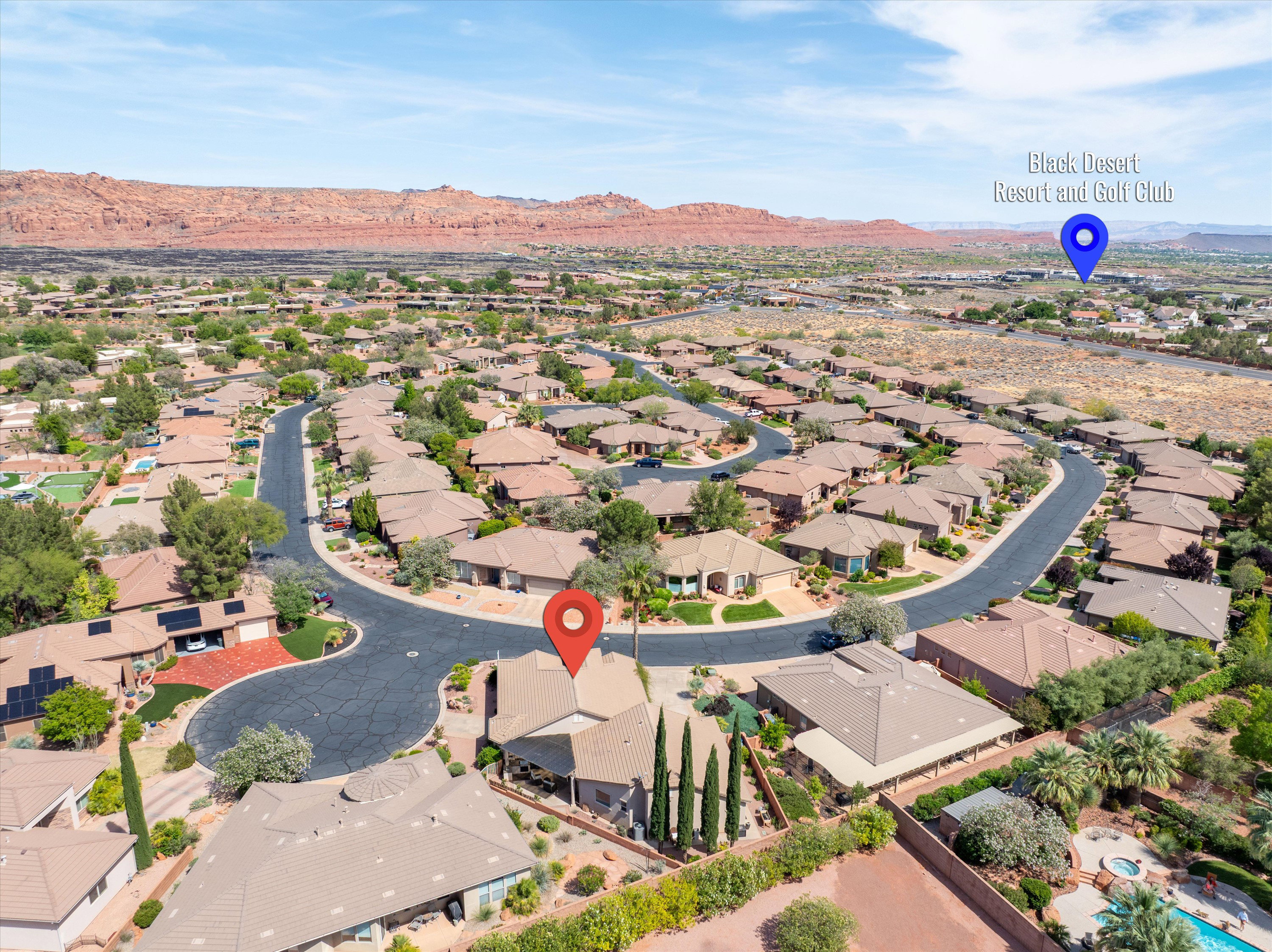 Aerial overview of property's location with nearby suburban area