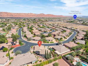 Aerial overview of property's location with nearby suburban area