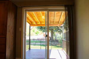 View of sliding glass door to covered Deck