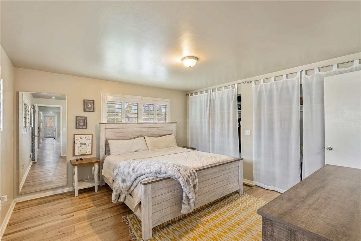 Bedroom with light wood-style flooring