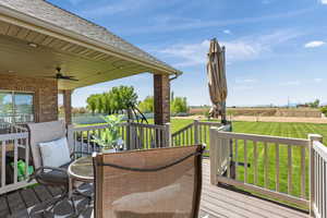 Deck featuring ceiling fan and outdoor dining area