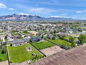Aerial view of residential area featuring mountains