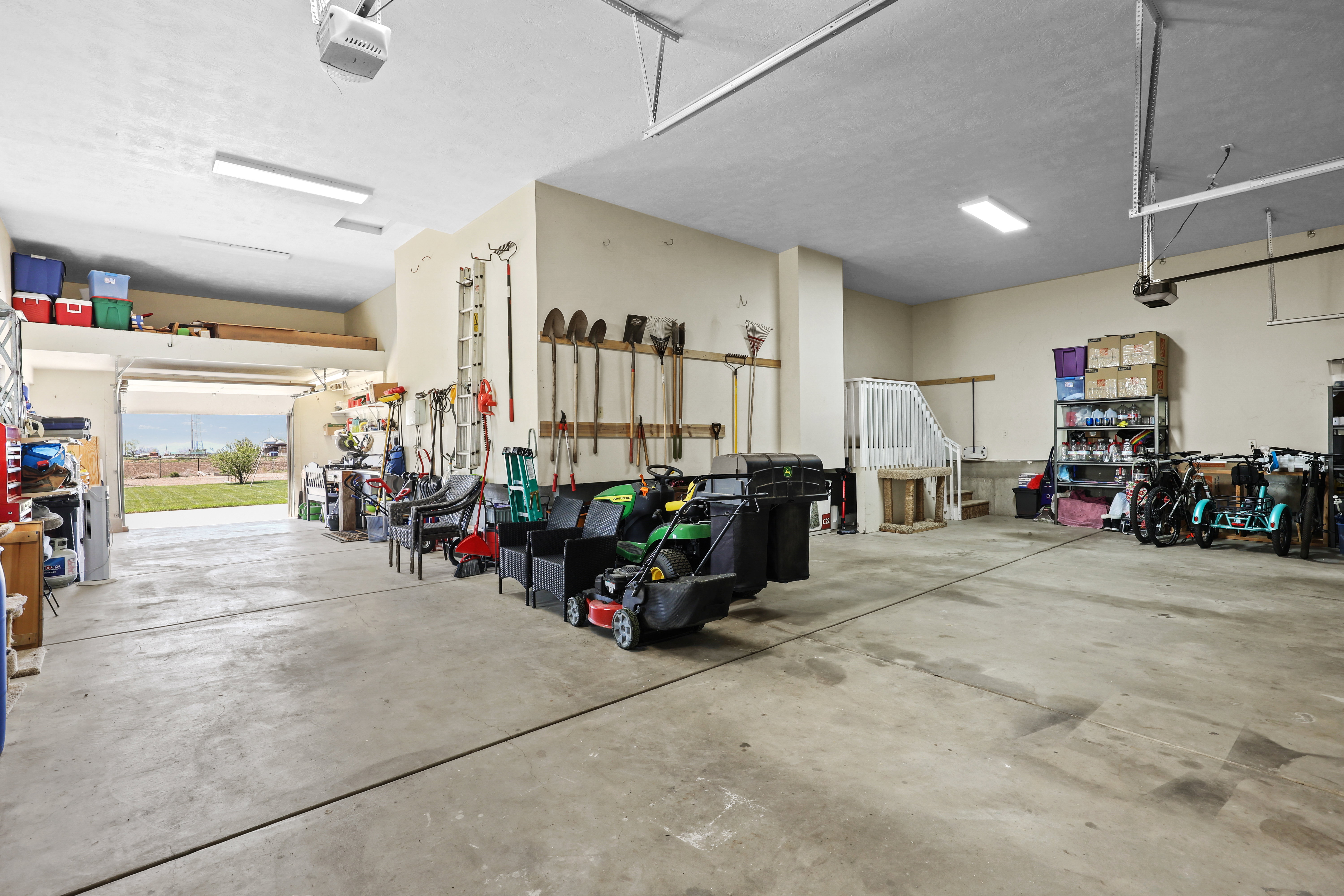 Garage featuring a garage door opener