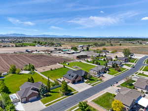 View of rural area featuring a mountainous background and nearby suburban area